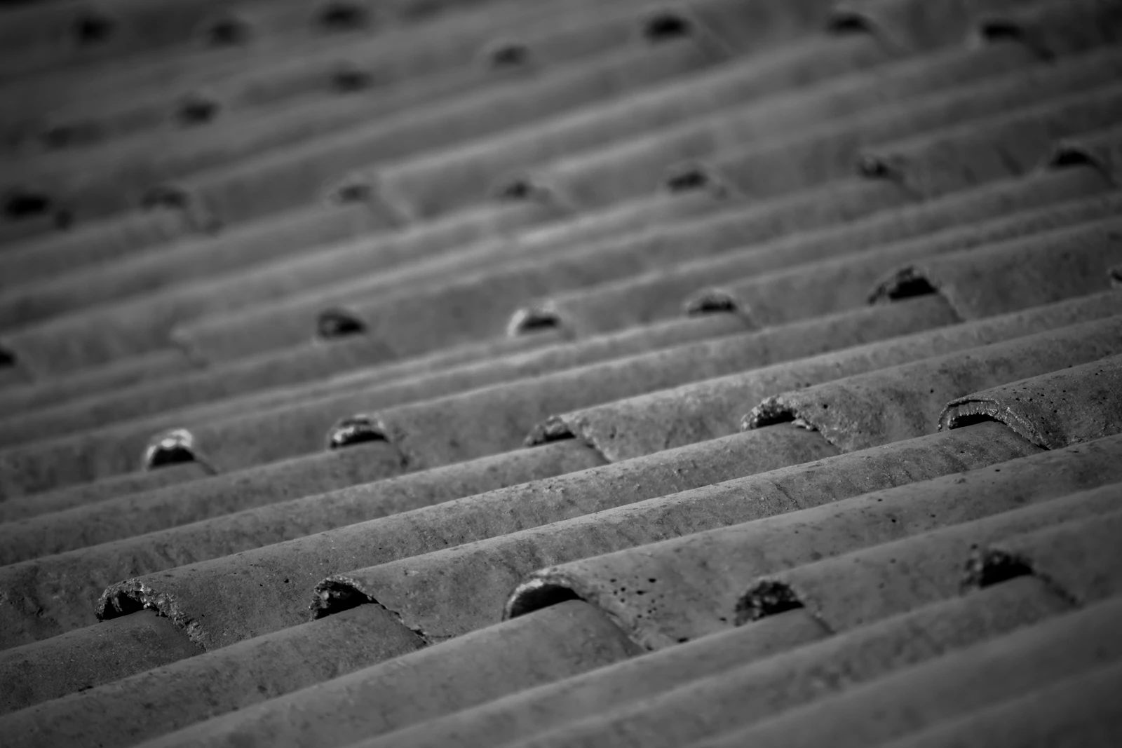 Close view of a weathered repeating roof surface